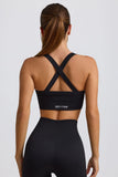 Super Sculpt Seamless Crossback Sports Bra in Black